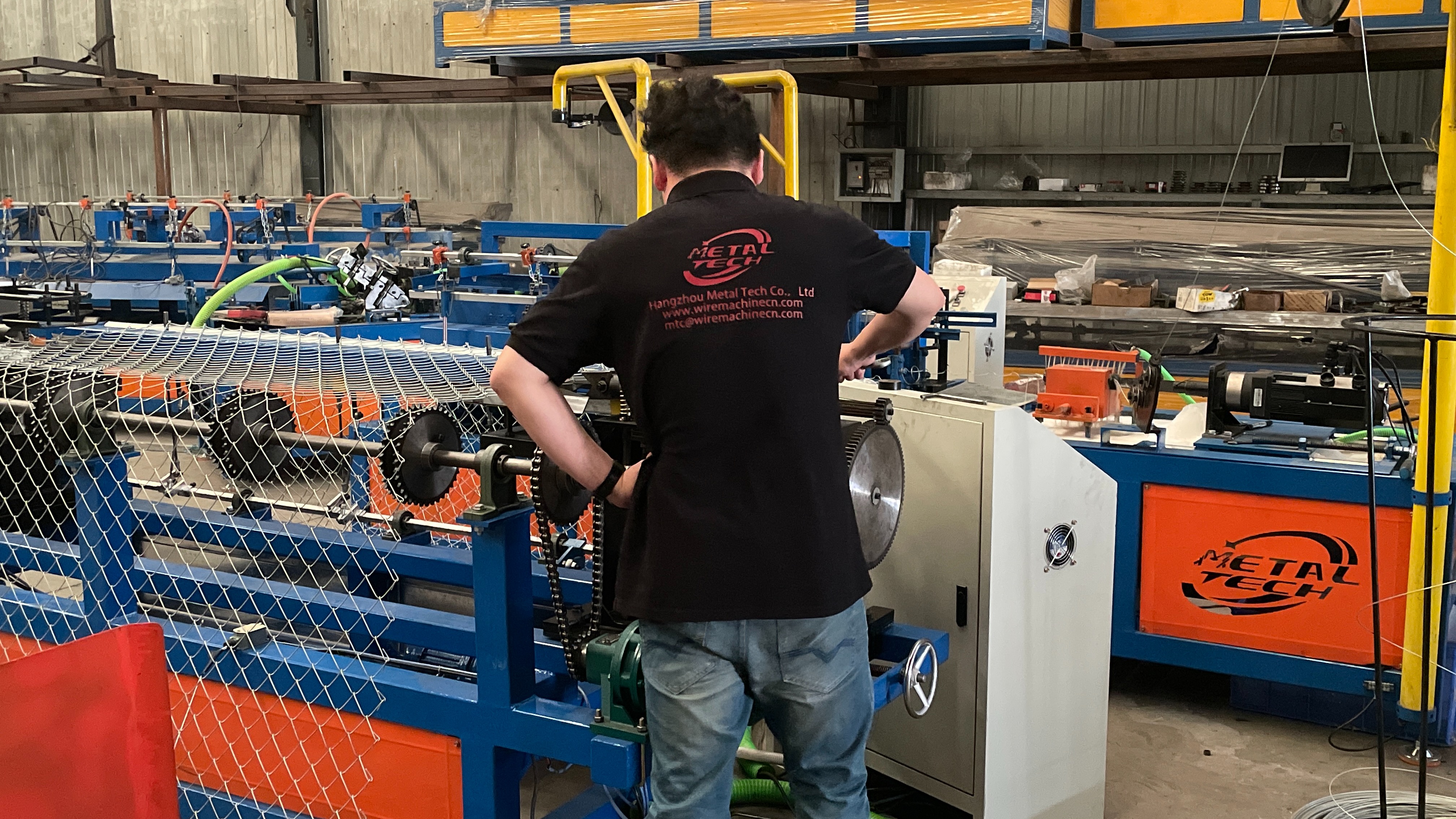 Engineers and Chain Link fence making machines.jpg